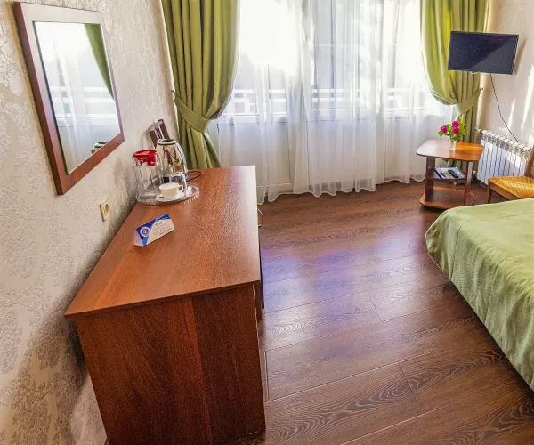 Одноместный улучшенный номер 1 категории в 3 корпусе в санатории имени Анджиевского в городе Ессентуки - фотография