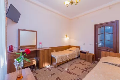 Двухместный номер 1 категории в 1 корпусе в санатории имени Анджиевского в городе Ессентуки - фотография